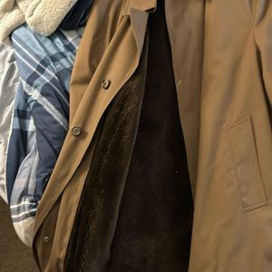 Tan with zipper lining. Waterproof